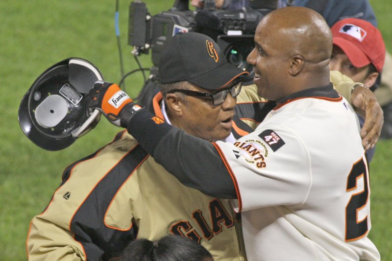 Willie Mays (L) was the godfather to fellow San Francisco Giants legend Barry Bonds. File Photo by Terry Schmitt/UPI