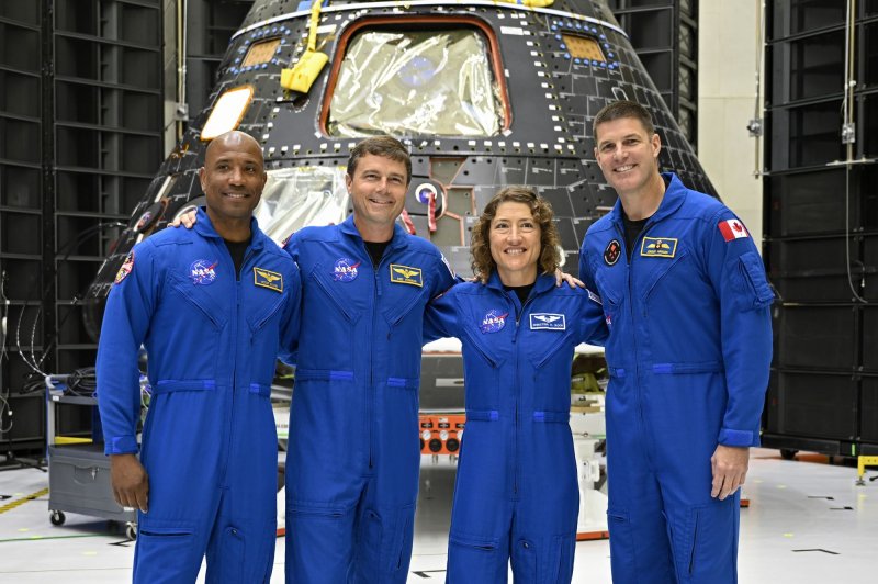 NASA's Artemis II crew (l to r), Pilot Victor Glover, Commander Reid Wiseman, Mission Specialist Christina Koch and Mission Specialist from the Canadian Space Agency, Jeremy Hansen are on hand to view the Orion spacecraft as it is being prepared for their mission planned for late 2024. File Photo by Joe Marino/UPI