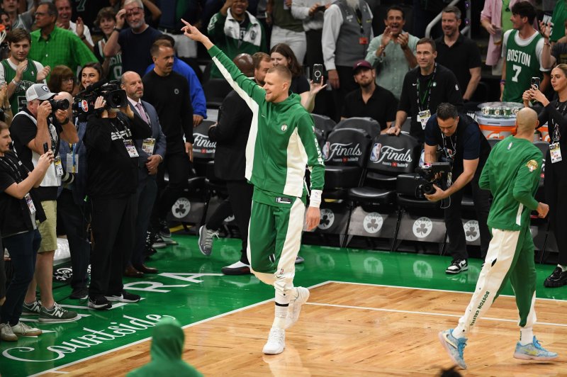 Boston Celtics center Kristaps Porzingis acknowledges the fans before Game 5 of the NBA Finals on Monday in Boston. Photo by Amanda Sabga/EPA-EFE