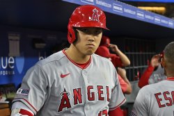 Free agent Shohei Ohtani signs with L.A. Dodgers in stunning $700M deal