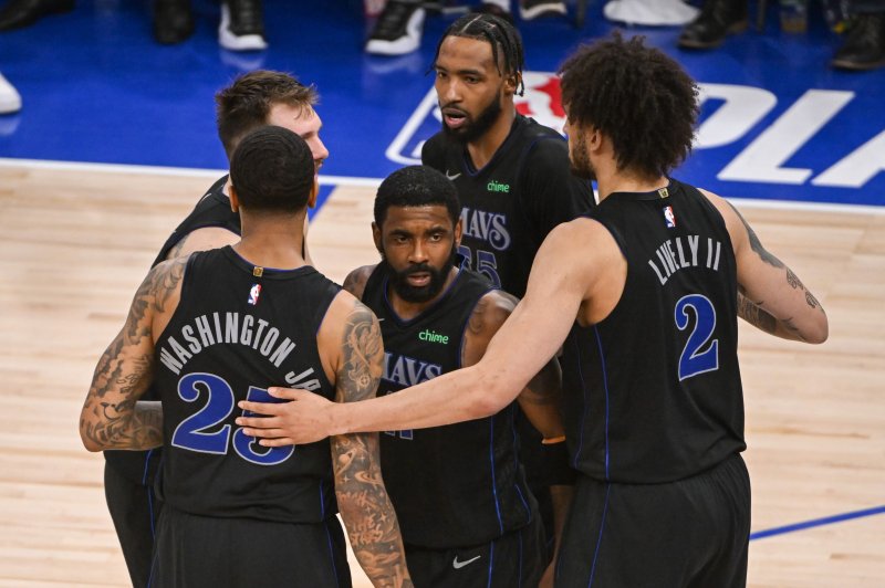 Dallas Mavericks guard Kyrie Irving (C) scored 36 points in a blowout win over the Minnesota Timberwolves in Game 5 of the Western Conference finals Thursday in Minneapolis. Photo by Craig Lassig/EPA-EFE