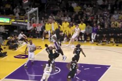 Lakers' LeBron James throws down powerful dunk on Clippers' Paul George