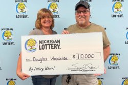 Man wins $110,000 lottery prize while away on vacation