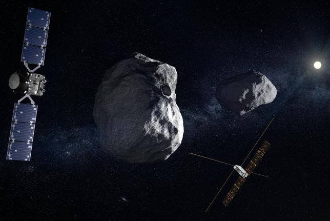 This artist’s concept shows the European Space Agency's Hera spacecraft and its CubeSats in orbit around the Dimorphos moonlet. NASA has selected 12 participating scientists to join the ESA Hera mission astroid planetary defense mission. Artist Image by ESA-Science Office