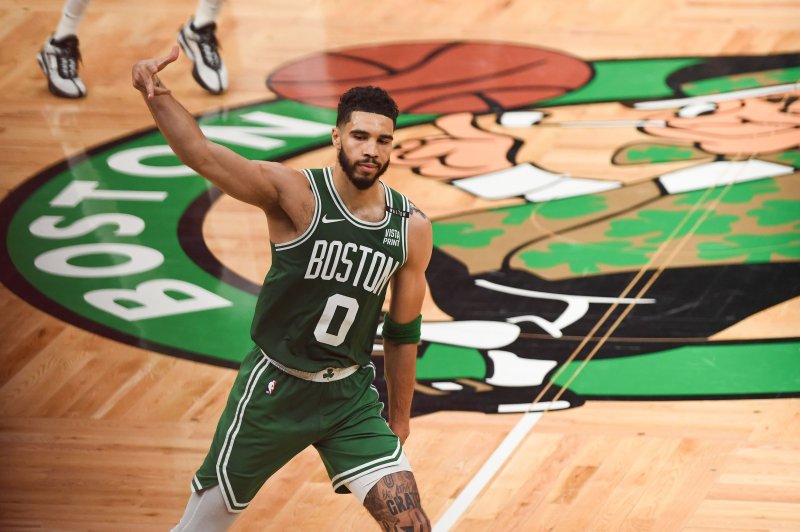 Boston Celtics forward Jayson Tatum reacts after making a 3-point basket against the Dallas Mavericks during the first half of Game 5 of the NBA Finals on Monday in Boston. Photo by Amanda Sabga/EPA-EFE