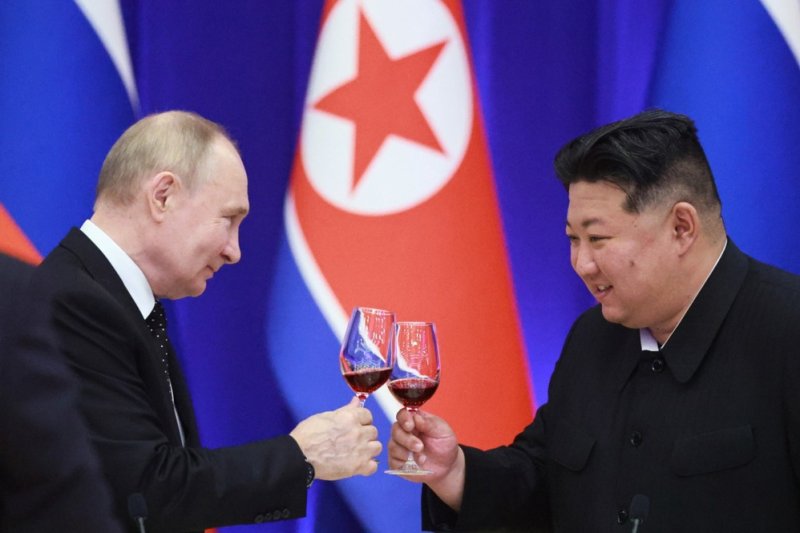 Russian President Vladimir Putin (L) and North Korean leader Kim Jong Un signed a treaty that promises mutual military aid if either side is attacked, North Korean state media reported Thursday. Putin's visit to North Korea was his first since 2000. Kremlin Pool Photo by Vladimir Smirnov/Sputnik/EPA-EFE