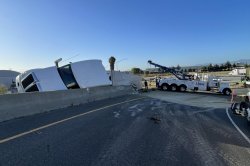 Overturned strawberry truck causes jam on two highways