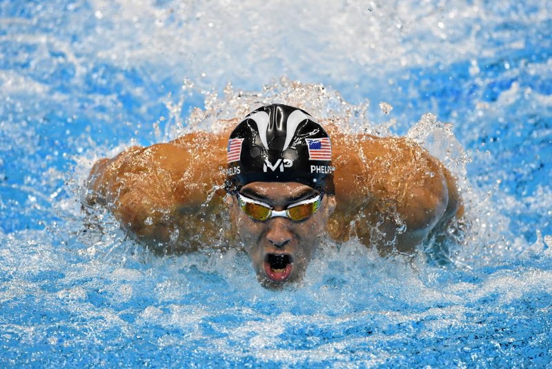 Michael Phelps of the United States competes in the final of the Men's 4 x 100m Medley Relay at the Olympic Aquatics Stadium at the 2016 Rio Summer Olympics in Rio de Janeiro, Brazil, on August 13, 2016. On Tuesday, Phelps testified before a House subcommittee about inconsistencies with the World Anti-Doping Agency. File Photo by Richard Ellis/UPI