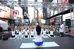 Yogis celebrate solstice with Times Square takeover